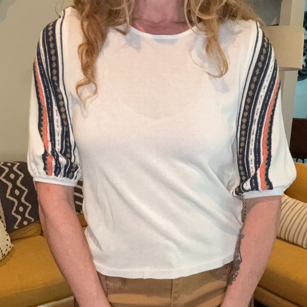 Aldo Martins White Top with Black and Orange Striped Sleeves